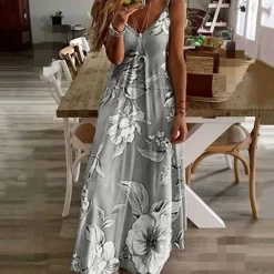 Jurken & Jumpsuits Dames*AINO - Zomerse Bloemenjurk met V-hals