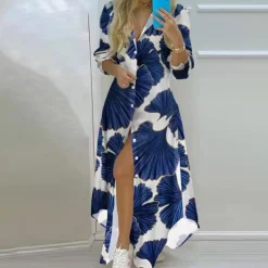 Jurken & Jumpsuits Dames*Antonia - Luxe Zomerjurk met Artistieke Kranten Print