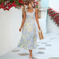 Jurken & Jumpsuits Dames*BRIA - Modieuze zomerse gebloemde midi-jurk