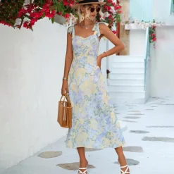 Jurken & Jumpsuits Dames*BRIA - Modieuze zomerse gebloemde midi-jurk