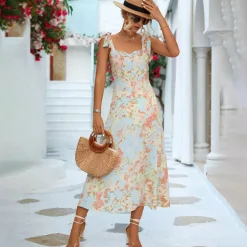 Jurken & Jumpsuits Dames*BRIA - Modieuze zomerse gebloemde midi-jurk