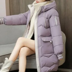 Jassen Dames*Cyra - Comfortabele en stijlvolle damesjas met capuchon