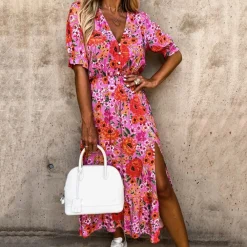 Jurken & Jumpsuits Dames*DARIA - Zomerse casual jurk met split