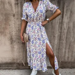 Jurken & Jumpsuits Dames*DARIA - Zomerse casual jurk met split