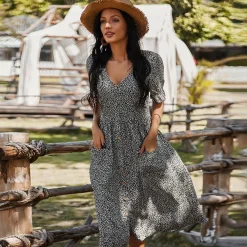 Jurken & Jumpsuits Dames*EVERLEIGH - Zomerse midi-jurk met knopen