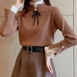 Truien & Vesten Dames*Inna - Zomerse halve col dames trui met strik