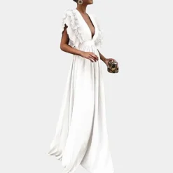 Jurken & Jumpsuits Dames*Kailey - Zomerse damesjurk met mouwen met ruches