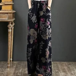 Broeken & Rokken Dames*Kirsi - Elegante wijde zomerbroek met bloemenprint