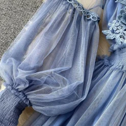 Jurken & Jumpsuits Dames*Leticia - Stijlvolle Zomer Bloemenjurk met Opstaande Kraag en Lantaarnmouwen