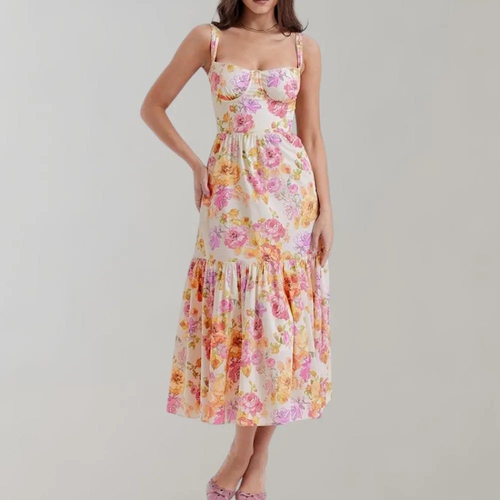 Jurken & Jumpsuits Dames*Lucca - Zomerse gebloemde en uitlopende midi-jurk Roze