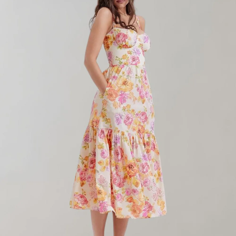 Jurken & Jumpsuits Dames*Lucca - Zomerse gebloemde en uitlopende midi-jurk Roze