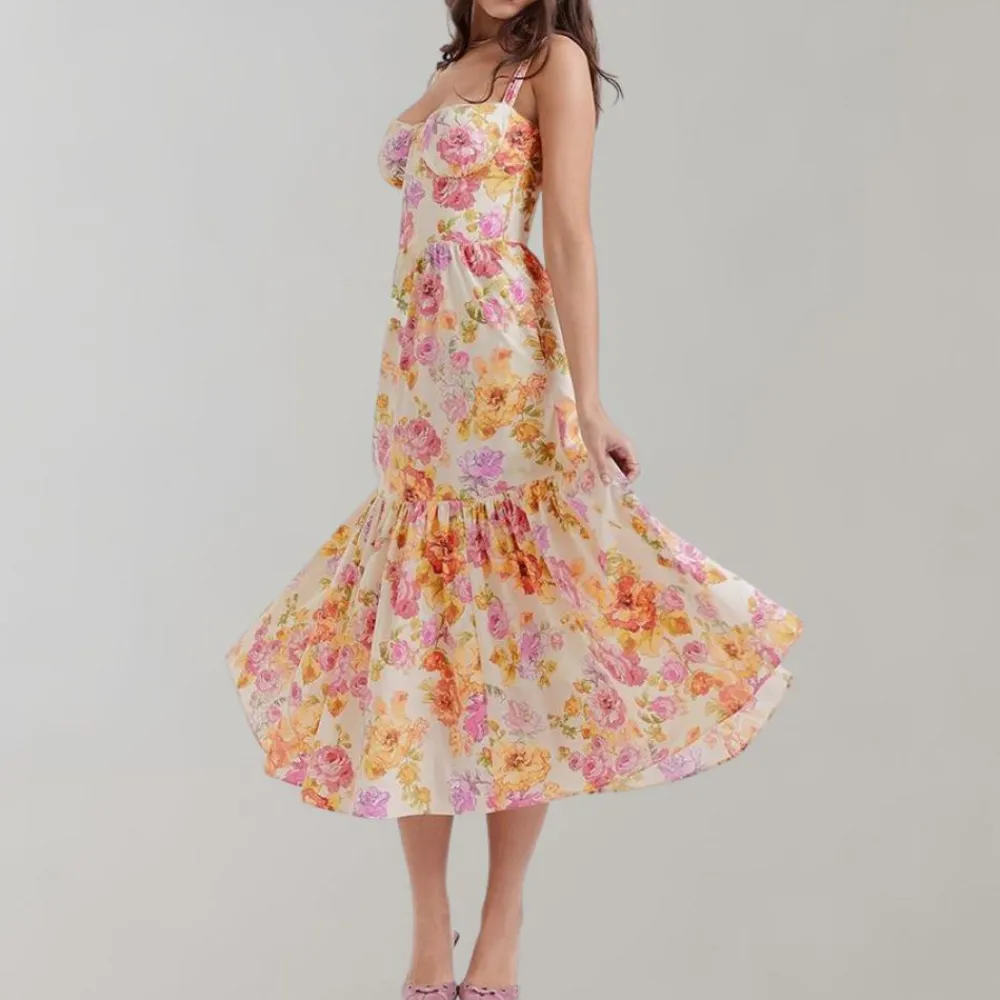 Jurken & Jumpsuits Dames*Lucca - Zomerse gebloemde en uitlopende midi-jurk Roze