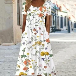 Jurken & Jumpsuits Dames*MINA - Casual bloemenjurk voor de zomer