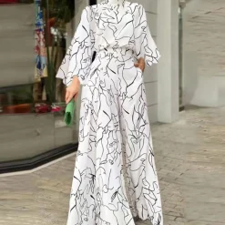 Jurken & Jumpsuits Dames*Modieuze zomerse jumpsuit met lange mouwen voor dames