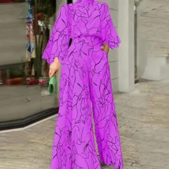 Jurken & Jumpsuits Dames*Modieuze zomerse jumpsuit met lange mouwen voor dames