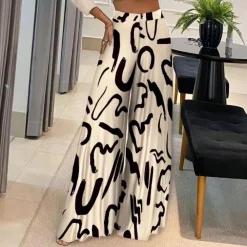 Broeken & Rokken Dames*Ruby - Luchtige damesbroek met artistieke vloeiing en wijde pijpen voor de zomer