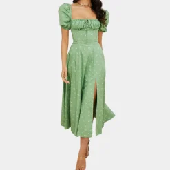 Jurken & Jumpsuits Dames*Sylvie - Zomerse gebloemde damesjurk met split