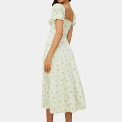 Jurken & Jumpsuits Dames*Sylvie - Zomerse gebloemde damesjurk met split